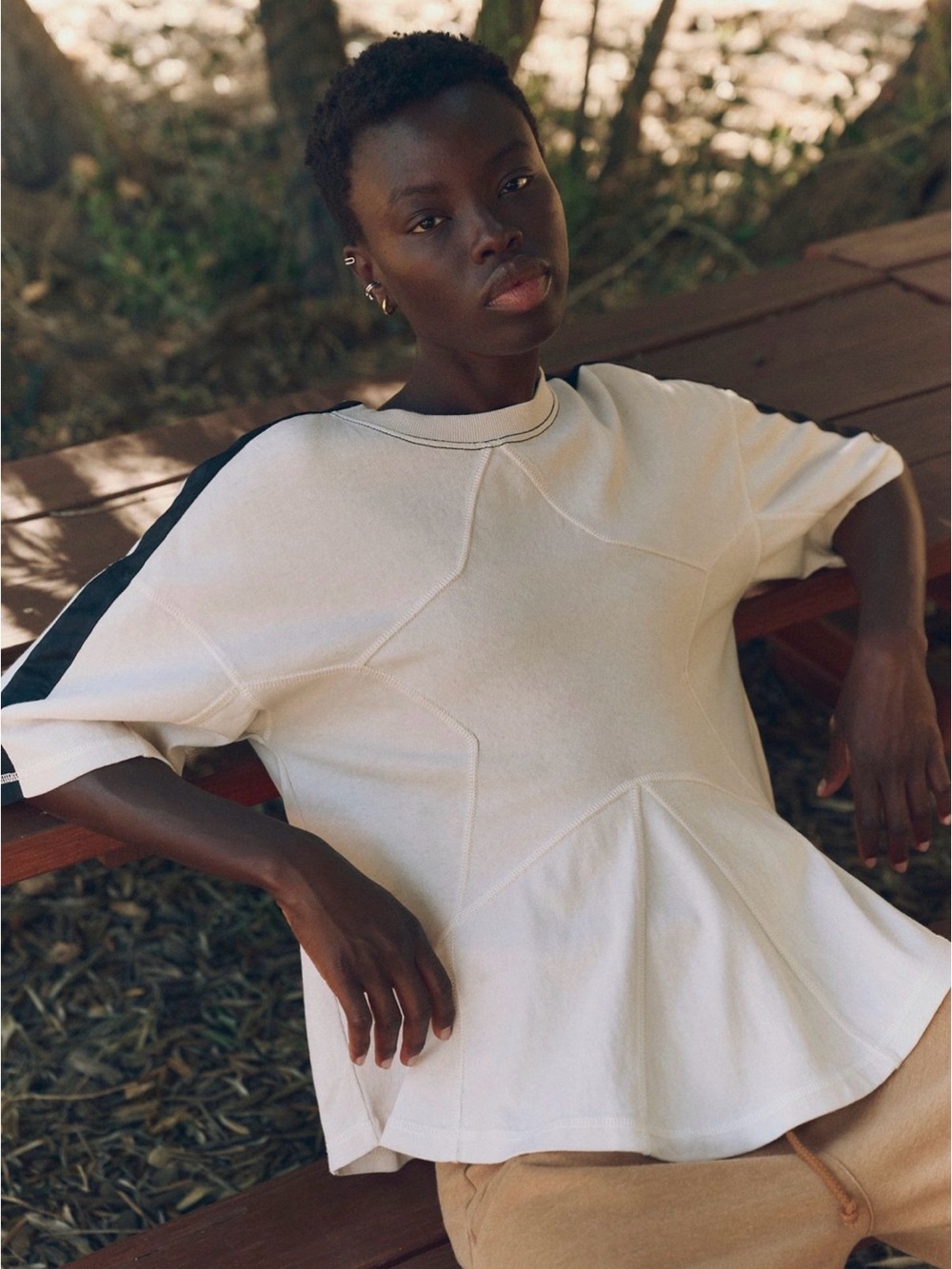 FP Movement by Free People She’s A Star Cream Peplum Sweatshirt with Racerstripe